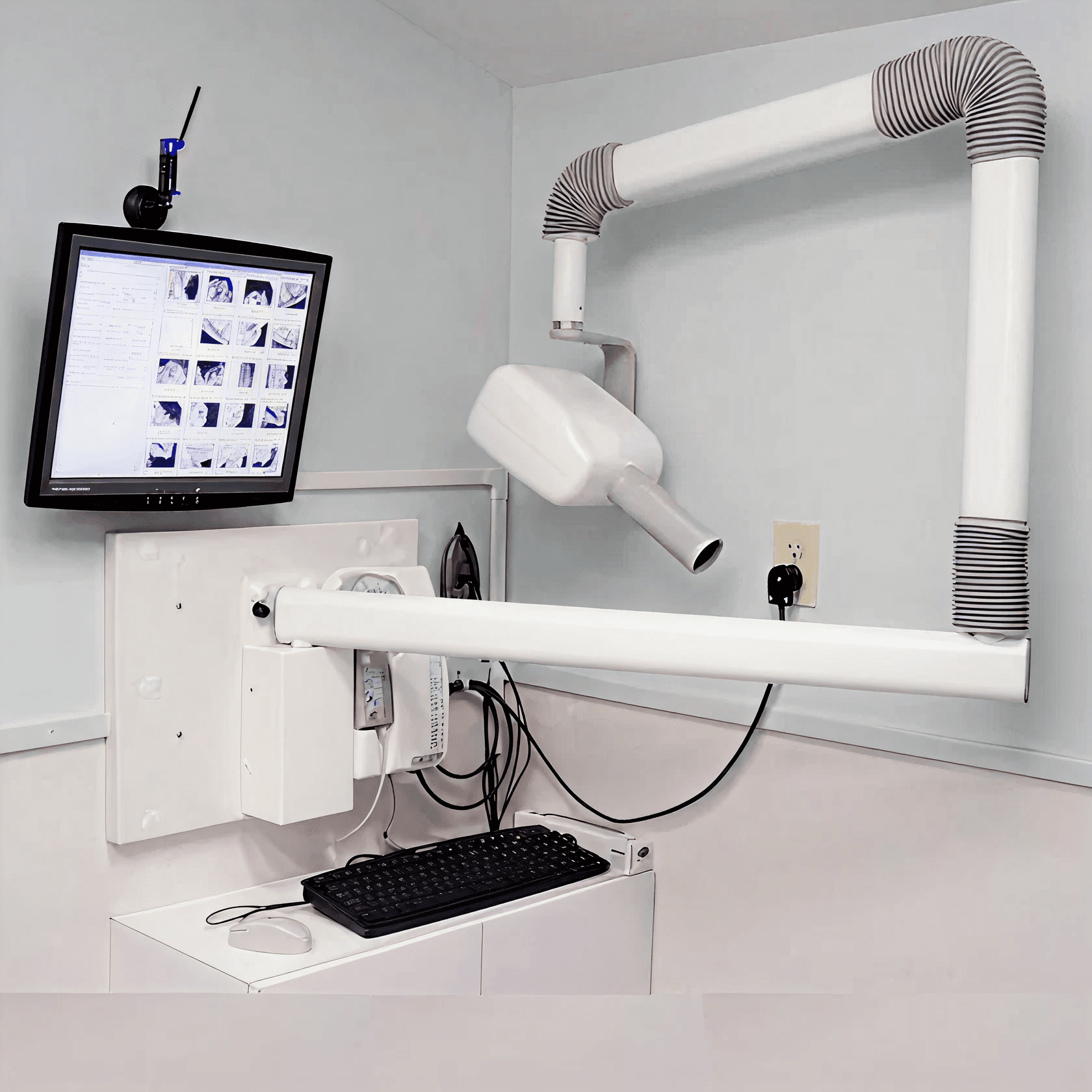 Dentist reviewing an RVG X-ray