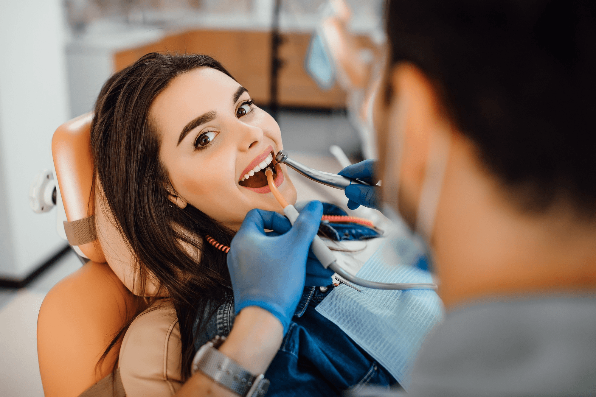 Woman at dentist for routine checkup.