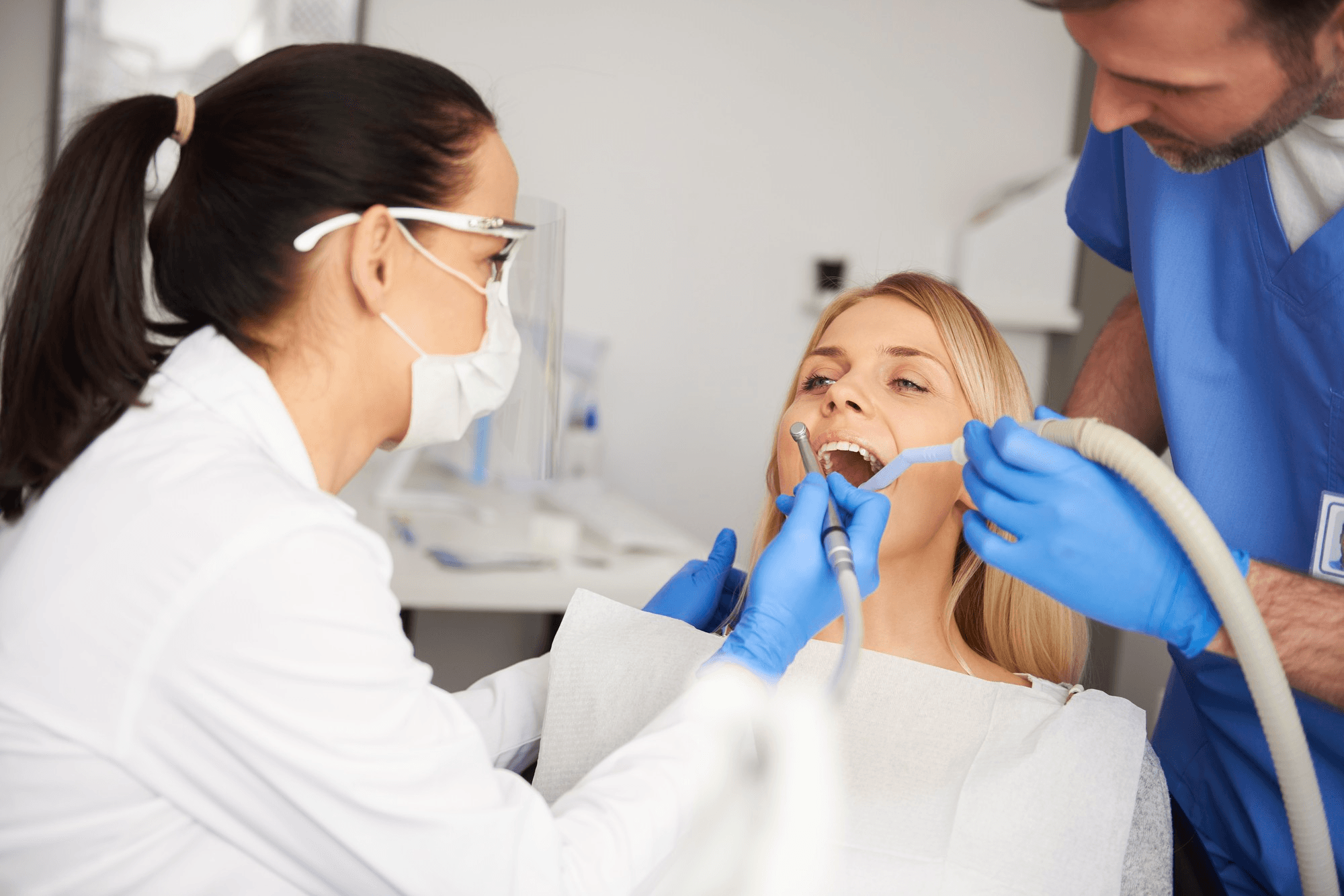 Woman undergoing root canal treatment.